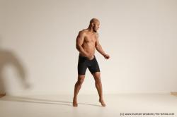 Underwear Man Black Muscular Bald Dancing Dynamic poses Academic